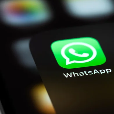WhatsApp mobile icon app on screen smartphone iPhone macro. WhatsApp is a popular free instant text messaging system for mobile and other platforms. Moscow, Russia - June 15, 2021<!-- NICAID(15767366) -->