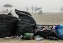 Primeira manhã de 2022 tem neblina, festas na praia e limpeza de lixo em Capão da Canoa 