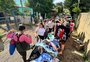 Atingidos por enchentes nas ilhas da Capital recebem doações de roupas e calçados