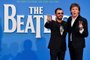 (FILES) In this file photo taken on September 15, 2016 British musicians Paul McCartney (R) and Ringo Starr (L) of legendary rock-band The Beatles pose as they arrive on the red carpet to attend a special screening of the film "The Beatles Eight Days A Week: The Touring Years" in London. - Paul McCartney will celebrate his 80th birthday on June 18, 2022. (Photo by Ben STANSALL / AFP)<!-- NICAID(15127284) -->