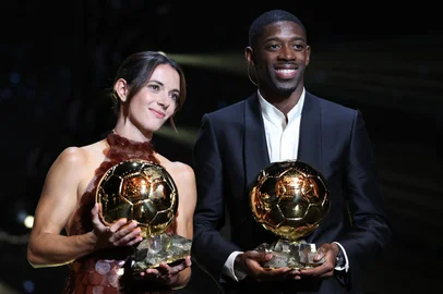 Paris Saint-Germain's French forward Ousmane Dembele and Barcelona's Spanish midfielder and Ballon dOr 2024 winner Aitana Bonmati pose after receiving the Ballon d'Or awards during the 2025 Ballon d'Or France Football award ceremony at the Theatre du Chatelet in Paris on September 22, 2025. (Photo by Franck FIFE / AFP)<!-- NICAID(16130607) -->