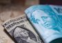 Dólar cai ao menor valor desde maio de 2024 e bolsa bate novo recorde em 181 mil pontos