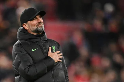 (FILES) Liverpool's German manager Jurgen Klopp celebrates after his team victory at the end of the English League Cup quarter-final football match between Liverpool and West Ham United at Anfield in Liverpool, north west England on December 20, 2023. Liverpool manager Jurgen Klopp announced the shock decision on January 26, 2024 that he will leave the club at the end of the season. (Photo by Oli SCARFF / AFP) / RESTRICTED TO EDITORIAL USE. No use with unauthorized audio, video, data, fixture lists, club/league logos or 'live' services. Online in-match use limited to 120 images. An additional 40 images may be used in extra time. No video emulation. Social media in-match use limited to 120 images. An additional 40 images may be used in extra time. No use in betting publications, games or single club/league/player publications. / Editoria: SPOLocal: LiverpoolIndexador: OLI SCARFFSecao: soccerFonte: AFPFotógrafo: STF<!-- NICAID(15661847) -->