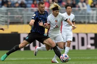 Inter Milan's Dutch defender #06 Stefan de Vrij (L) and Urawa Red Diamonds' Japanese forward #24 Yusuke Matsuo fight for the ball during the FIFA Club World Cup 2025 Group E football match between Italy's Inter Milan and Japan's Urawa Red Diamonds at the Lumen Field stadium in Seattle on June 21, 2025. (Photo by JUAN MABROMATA / AFP)<!-- NICAID(16064805) -->