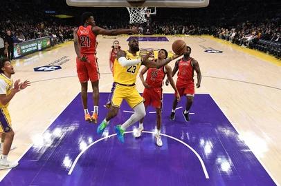 LOS ANGELES, CA - MARCH 4: LeBron James #23 of the Los Angeles Lakers drives to the basket during the game against the New Orleans Pelicans on March 4, 2025 at Crypto.Com Arena in Los Angeles, California. NOTE TO USER: User expressly acknowledges and agrees that, by downloading and/or using this Photograph, user is consenting to the terms and conditions of the Getty Images License Agreement. Mandatory Copyright Notice: Copyright 2025 NBAE   Juan Ocampo/NBAE via Getty Images/AFP (Photo by Juan Ocampo / NBAE / Getty Images / Getty Images via AFP)<!-- NICAID(15988940) -->
