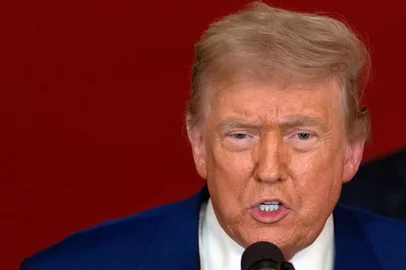 O presidente dos EUA, Donald Trump, discursa à nação na Casa Branca em Washington, DC, em 21 de junho de 2025, após o anúncio de que os EUA bombardearam instalações nucleares no Irã. (Photo by CARLOS BARRIA / POOL / AFP)<!-- NICAID(16065864) -->