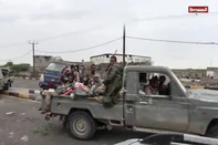 This screen grab taken from video footage released by the Houthi rebels' Al-Masirah TV channel and made available via AFPTV on September 11, 2026, purportedly shows their fighters in the streets of Mocha, as the group claims to have taken control of the strategic Red Sea port city from Saudi-backed forces. The Iran-backed Houthis seized control of Yemen's entire Red Sea coast and captured three strategic islands on September 11, 2026, in a lightning offensive that cemented their hold on a vital shipping corridor linking Europe and Asia. After a week-long offensive that has left hundreds dead, government officials said the Houthis now hold the Yemeni side of the Bab al-Mandab Strait, the southern gateway to the Red Sea and, in turn, the Suez Canal. (Photo by AL-MASIRAH TV / AFP) / RESTRICTED TO EDITORIAL USE - MANDATORY CREDIT "AFP PHOTO / AL-MASIRAH TV " - HANDOUT - NO MARKETING NO ADVERTISING CAMPAIGNS - DISTRIBUTED AS A SERVICE TO CLIENTS<!-- NICAID(16363971) -->