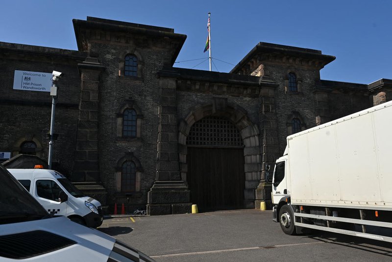 A van approaches the gates of HM Prison Wandsworth in south London on September 7, 2023, a day after terror suspect, Daniel Abed Khalife escaped from the prison while awaiting trial. British authorities have issued an all-ports alert to track down a former soldier awaiting trial on terrorism charges, after he escaped from jail by clinging to the bottom of a delivery van. (Photo by JUSTIN TALLIS / AFP)<!-- NICAID(15535605) -->