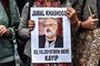 A woman holds a portrait of missing journalist and Riyadh critic Jamal Khashoggi reading "Jamal Khashoggi is missing since October 2" during a demonstration in front of the Saudi Arabian consulate on October 9, 2018 in IstanbulKhashoggi, a Washington Post contributor, vanished last on October 2 after entering the Saudi Arabian consulate to receive official documents ahead of his marriage to a Turkish woman. A Turkish government source told AFP at the weekend that the police believe the journalist "was killed by a team especially sent to Istanbul and who left the same day". / AFP PHOTO / OZAN KOSE