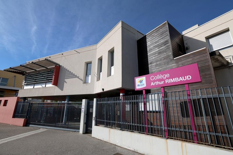 This photograph taken on April 4, 2024 in Montpellier, southern France, shows the entrance of the College Arthur-Rimbaud secondary school a day after a 14-year-old girl was assaulted outside the school. Three minors, at least one of whom attended the same establishment, were taken into custody on April 3 for attempted murder of a minor, according to a press release from the Montpellier public prosecutor's office. (Photo by Pascal GUYOT / AFP)<!-- NICAID(15727909) -->
