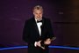 British director Christopher Nolan accepts the award for Best Director for "Oppenheimer" onstage during the 96th Annual Academy Awards at the Dolby Theatre in Hollywood, California on March 10, 2024. (Photo by Patrick T. Fallon / AFP)<!-- NICAID(15701662) -->