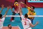 Brazil's Douglas Correia de Souza (R) spikes the ball in the men's preliminary round pool B volleyball match between Brazil and Tunisia during the Tokyo 2020 Olympic Games at Ariake Arena in Tokyo on July 24, 2021. (Photo by YURI CORTEZ / AFP)Editoria: SPOLocal: TokyoIndexador: YURI CORTEZSecao: volleyballFonte: AFPFotógrafo: STF<!-- NICAID(14843887) -->