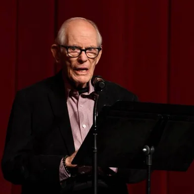 US lyricist Alan Bergman sings on stage for the US premiere of "Les Miserables" during Colcoa French Film Festival Opening Night at the DGA theatre in Los Angeles on September 23, 2019. (Photo by Valerie MACON / AFP)<!-- NICAID(16083914) -->