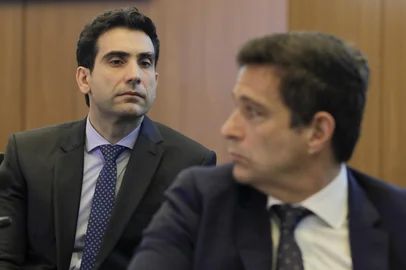 The director of Monetary Policy of the Central Bank of Brazil, Gabriel Galipolo, who has been nominated to be the new President of the Central Bank of Brazil, looks on during a press conference on the quarterly inflation report, at the Central Bank's headquarters in Brasilia, on December 19, 2024. (Photo by Sergio LIMA / AFP)Editoria: FINLocal: BrasíliaIndexador: SERGIO LIMASecao: economy (general)Fonte: AFPFotógrafo: STR<!-- NICAID(15939141) -->