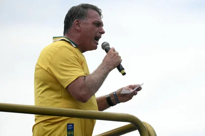 Brazil's former president Jair Bolsonaro speaks during a rally in Rio de Janeiro, Brazil, on March 16, 2025. Facing a possible trial for attempted coup d'état, former Brazilian president Jair Bolsonaro called on his supporters to demonstrate this Sunday in Rio de Janeiro to show that he remains leader of the opposition ahead of the 2026 elections. (Photo by Mauro PIMENTEL / AFP)<!-- NICAID(15996549) -->