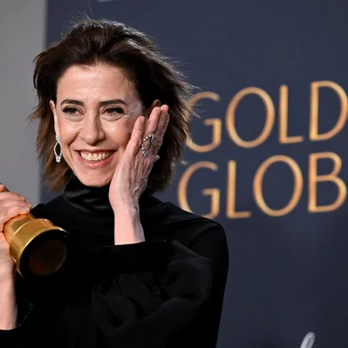 Brazilian actress Fernanda Torres poses with the Best Performance by a Female Actor in a Motion Picture  Drama award for "I'm Still Here" in the press room during the 82nd annual Golden Globe Awards at the Beverly Hilton hotel in Beverly Hills, California, on January 5, 2025. (Photo by Robyn Beck / AFP)<!-- NICAID(15947843) -->