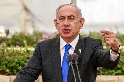 Israeli Prime Minister Benjamin Netanyahu speaks during a state memorial ceremony for the victims of the 1948 Altalena affair, at Nachalat Yitzhak cemetery in Tel Aviv on June 18, 2024. (Photo by Shaul GOLAN / POOL / AFP)<!-- NICAID(15796181) -->