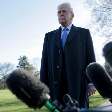 WASHINGTON, DC - MARCH 21: U.S. President Donald Trump speaks to reporters before boarding Marine One at the White House on March 21, 2025 in Washington, DC. Trump is traveling to Bedminster, New Jersey and is expected to attend the 2025 NCAA Division I Mens Wrestling Championship in Philadelphia tomorrow.   Anna Moneymaker/Getty Images/AFP (Photo by Anna Moneymaker / GETTY IMAGES NORTH AMERICA / Getty Images via AFP)<!-- NICAID(16001173) -->