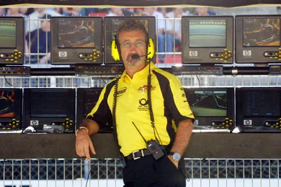 (FILES) British Jordan-Honda Director Eddie Jordan sits on the pitwall of the Montmelo racetrack near Barcelona during the first free practice session, on April 26, 2002 two days before the Catalunya Formula One Grand Prix in Spain. Former Formula One team owner Eddie Jordan, who had been suffering from cancer, has died aged 76, his family announced on March 20, 2025. "It is with profound sadness that we announce the passing of Eddie Jordan OBE, the ex-Formula 1 team owner, TV pundit and entrepreneur," his family said in a statement. (Photo by AURELIA BAILLY / AFP)<!-- NICAID(15999256) -->