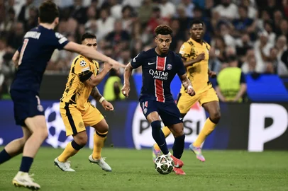 Football: UEFA Champions League - Final: Paris SG (FRA) v Inter Milan (ITA)Paris Saint-Germain's French midfielder #14 Desire Doue controls the ball during the UEFA Champions League final football match between Paris Saint-Germain (PSG) and Inter Milan in Munich, southern  on May 31, 2025. (Photo by Marco BERTORELLO / AFP)Editoria: SPOLocal: MunichIndexador: MARCO BERTORELLOSecao: soccerFonte: AFPFotógrafo: STF<!-- NICAID(16049964) -->