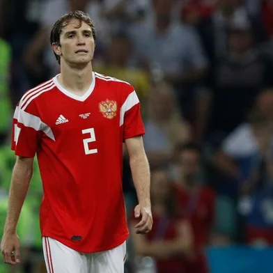 Russia's defender Mario Fernandes reacts after missing a penalty during the Russia 2018 World Cup quarter-final football match between Russia and Croatia at the Fisht Stadium in Sochi on July 7, 2018.  Adrian DENNIS / AFP