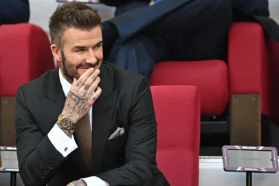 Former England player David Beckham attends the Qatar 2022 World Cup Group B football match between England and Iran at the Khalifa International Stadium in Doha on November 21, 2022. (Photo by Paul ELLIS / AFP)<!-- NICAID(15271354) -->