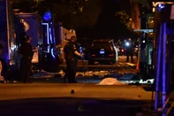 Vancouver police investigate a crime scene after a man drove into pedestrians at the annual Lapu Lapu festival celebrating Filipino culture, at East 43rd Avenue and Fraser, in the south of Vancouver on April 26, 2025. Canadian police arrested a man on April 26 after a car plowed into a street party in the western city of Vancouver killing a number of people. Authorities said the incident happened shortly after 8:00 pm (0300 GMT Sunday) in Vancouver's Sunset on Fraser neighborhood as members of the Filipino community gathered to celebrate Lapu Lapu Day. (Photo by Don MacKinnon / AFP)<!-- NICAID(16025204) -->