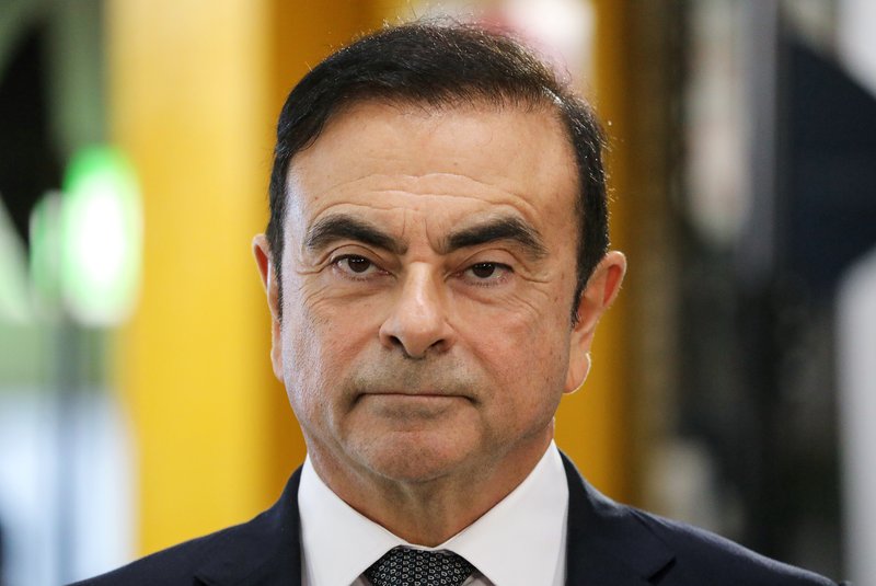 (FILES) In this file photograph taken on November 8, 2018. Chairman and CEO of Renault-Nissan-Mitsubishi Carlos Ghosn looks on during a visit of the French President to a Renault factory at Maubeuge, northern France - Nissan board members have sacked Carlos Ghosn as chairman, local Japanese media reported on November 22, 2018, which would be a spectacular fall from grace for the once-revered boss whose arrest for financial misconduct stunned the car industry and the business world. (Photo by Ludovic MARIN / AFP)