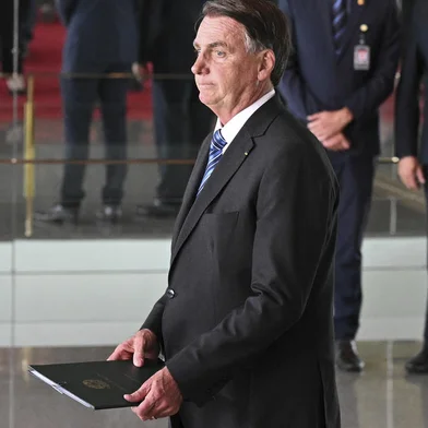 Brazilian President Jair Bolsonaro appears to make a statement for the first time since Sunday's presidential run-off election, at Alvorada Palace in Brasilia, on November 1, 2022. - Brazil's Bolsonaro sais will 'comply' with constitution after poll loss. (Photo by EVARISTO SA / AFP)Editoria: POLLocal: BrasíliaIndexador: EVARISTO SASecao: electionFonte: AFPFotógrafo: STF<!-- NICAID(15252676) -->