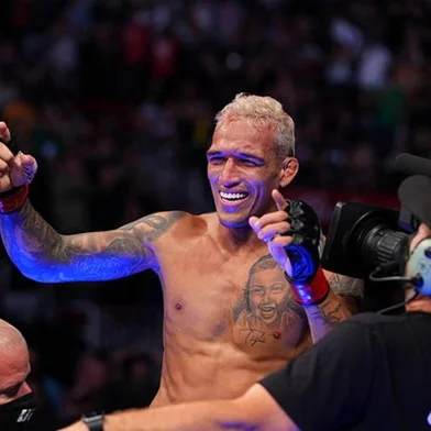 UFC 262: Oliveira v ChandlerHOUSTON, TEXAS - MAY 15: Charles Oliveira of Brazil reacts after defeating Michael Chandler in their UFC lightweight championship bout at Toyota Center on May 15, 2021 in Houston, Texas. (Photo by Josh Hedges/Zuffa LLC)Editoria: SLocal: HoustonIndexador: Josh HedgesSecao: MARFonte: Zuffa LLCFotógrafo: Contributor<!-- NICAID(16068269) -->
