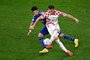 Japan's defender #19 Hiroki Sakai fights for the ball with Croatia's forward #17 Ante Budimir during the Qatar 2022 World Cup round of 16 football match between Japan and Croatia at the Al-Janoub Stadium in Al-Wakrah, south of Doha on December 5, 2022. (Photo by Anne-Christine POUJOULAT / AFP)Editoria: SPOLocal: DohaIndexador: ANNE-CHRISTINE POUJOULATSecao: soccerFonte: AFPFotógrafo: STF<!-- NICAID(15286001) -->