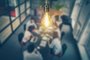 Young business people are discussing together a new startup project. A glowing light bulb as a new idea. - Foto: REDPIXEL/stock.adobe.comFonte: 216576321<!-- NICAID(15309891) -->