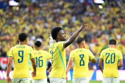 Brazil's forward #07 Vinicius Junior celebrates after scoring his team's second goal during the 2026 World Cup Group C football match between Scotland and Brazil at the Miami Stadium in Miami Gardens on June 24, 2026.  (Photo by CHANDAN KHANNA / AFP)<!-- NICAID(16313579) -->