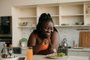Beautiful curvy African woman enjoying healthy eating for lunch at homeBeautiful curvy African woman enjoying healthy eating for lunch at homeIndexador: G-STOCK STUDIOFonte: 669210363<!-- NICAID(15612926) -->
