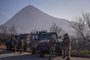 Italian soldiers serving in a NATO-led international peacekeeping mission in Kosovo patrol near a road barricaded with trucks by Serbs in the village of Rudare near the town of Zvecan on December 26, 2022. (Photo by Armend NIMANI / AFP)Editoria: WARLocal: ZvecanIndexador: ARMEND NIMANISecao: peacekeeping forceFonte: AFPFotógrafo: STR<!-- NICAID(15305344) -->