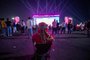 Football fans watch the Group A match between Qatar and Ecuador as they attend the FIFA Fan Festival at Al Bidda park in Doha on November 20, 2022, on the opening of the Qatar 2022 World Cup football tournament. (Photo by Philip FONG / AFP)<!-- NICAID(15273913) -->