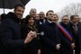 France's President Emmanuel Macron (C), President of the Paris Organising Committee of the 2024 Olympic and Paralympic Games Tony Estanguet (L), Mayor of Paris Anne Hidalgo (2nd L), General Manager of Solideo Nicolas Ferrand (3rd L), Mayor of Saint-Ouen-sur-Seine Karim Bouamrane (4th L), Ile-de-France's Regional Council President Valerie Pecresse (4th R), Seine Saint-Denis' Council member Stephane Troussel (2nd R) attend the inauguration of the Paris 2024 Olympic village in Saint-Denis, northern Paris, on February 29, 2024. The village, constructed on a 52-hectare site is located on a cluster of former industrial wastelands with the centerpiece being the Cite du Cinema. (Photo by Ludovic MARIN / POOL / AFP)Editoria: SPOLocal: Saint-DenisIndexador: LUDOVIC MARINSecao: societyFonte: POOLFotógrafo: STF<!-- NICAID(15692647) -->
