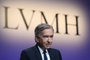 LMVH head Bernard Arnault announces the group's 2022 results at the LVMH headquarters in Paris on January 26, 2023. - The world's top luxury group LVMH said that its sales and net profit both hit new heights last year, driven by strong demand in Europe and the United States. Sales came in at 79 billion euros ($86 billion) and net profit at 14 billion euros for 2022 -- both new records for the group, whose brands include Bulgari, Givenchy, Louis Vuitton, and TAG Heuer. (Photo by Stefano Rellandini / AFP)Editoria: FINLocal: ParisIndexador: STEFANO RELLANDINISecao: annual reportFonte: AFPFotógrafo: STF<!-- NICAID(15394101) -->