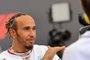 Mercedes' British driver Lewis Hamilton speaks to the press ahead of the Abu Dhabi Formula One Grand Prix at the Yas Marina Circuit in the Emirati city of Abu Dhabi on November 23, 2023. (Photo by Giuseppe CACACE / AFP)<!-- NICAID(15606400) -->