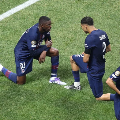 ATLANTA, GEORGIA - JULY 05: Ousmane Dembele #10 of Paris Saint-Germain celebrates scoring his team's second goal with teammate Achraf Hakimi #2 during the FIFA Club World Cup 2025 quarter-final match between Paris Saint-Germain and FC Bayern München at Mercedes-Benz Stadium on July 05, 2025 in Atlanta, Georgia.   Megan Briggs/Getty Images/AFP (Photo by Megan Briggs / GETTY IMAGES NORTH AMERICA / Getty Images via AFP)<!-- NICAID(16074085) -->