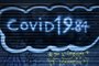 A graffiti on the closed iron curtain of a restaurant reads "Covid 19-84", referring to the book of Orwell 1984, on December 10, 2020 in Paris, as France is on a second lockdown in a bid to contain the spread of Covid-19 pandemic caused by the novel coronavirus.       ... (Photo by JOEL SAGET / AFP)<!-- NICAID(14665469) -->