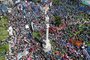 In this aerial view, members of labor unions protest against President Javier Mileis emergency decree during a demonstration called by Argentina's Labor Union (CGT) at Plaza Lavalle square in Buenos Aires on December 27, 2023. Argentina's libertarian President Javier Milei last week unleashed a mega-decree to change or scrap 366 economic rules in a country accustomed to heavy government intervention in the market. (Photo by Luis ROBAYO / AFP)<!-- NICAID(15635576) -->
