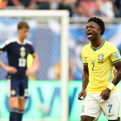 Brazil's forward #07 Vinicius Junior celebrates after scoring his team's first goal during the 2026 World Cup Group C football match between Scotland and Brazil at the Miami Stadium in Miami Gardens on June 24, 2026.  (Photo by PATRICIA DE MELO MOREIRA / AFP)<!-- NICAID(16313510) -->