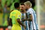 Argentina's forward Lionel Messi (C) and midfielder Rodrigo De Paul (R) argue with Brazil's forward Rodrygo during the 2026 FIFA World Cup South American qualification football match between Brazil and Argentina at Maracana Stadium in Rio de Janeiro, Brazil, on November 21, 2023. (Photo by CARL DE SOUZA / AFP)Editoria: SPOLocal: Rio de JaneiroIndexador: CARL DE SOUZASecao: soccerFonte: AFPFotógrafo: STF<!-- NICAID(15605621) -->