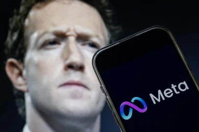 This photo illustration created on January 7, 2025, in Washington, DC, shows an image of Mark Zuckerberg, CEO of Meta, and an image of the Meta logo. Social media giant Meta on January 7, 2025, slashed its content moderation policies, including ending its US fact-checking program, in a major shift that conforms with the priorities of incoming president Donald Trump. (Photo by Drew ANGERER / AFP)<!-- NICAID(15949107) -->