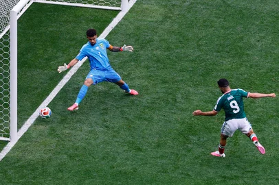 Mexico's forward #09 Raul Jimenez cscores his team's second goal during the 2026 World Cup Group A football match between Mexico and South Africa at the Mexico City Stadium in Mexico City on June 11, 2026. (Photo by Rodrigo OROPEZA / AFP)<!-- NICAID(16304675) -->