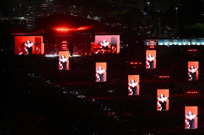 US pop star Lady Gaga is projected on big screens as she performs during her concert at Copacabana beach in Rio de Janeiro, Brazil on May 3, 2025. (Photo by MAURO PIMENTEL / AFP)<!-- NICAID(16029429) -->