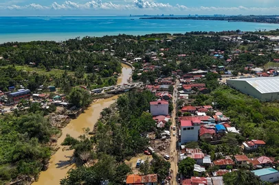 An aerial view shows Liloan town, in the province of Cebu on November 6, 2025, in the aftermath of Typhoon Kalmaegi. Typhoon Kalmaegi killed at least 140 people and left another 127 missing after unleashing devastating flooding across the central Philippines, official figures showed, as the storm headed towards Vietnam. (Photo by Jam STA ROSA / AFP)<!-- NICAID(16161917) -->