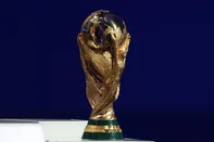 The FIFA World Cup trophy is seen on stage during the draw for the 2026 FIFA Football World Cup taking place in the US, Canada and Mexico, at the Kennedy Center, in Washington, DC, on December 5, 2025. (Photo by Dan Mullan / POOL / AFP)<!-- NICAID(16181195) -->