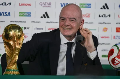 FIFA President Gianni Infantino gestures during a press conference with the World Cup trophy on the eve of the opening match of the 2026 World Cup football tournament at Mexico city stadium in Mexico City on June 10, 2026. (Photo by Alfredo ESTRELLA / AFP)<!-- NICAID(16304258) -->